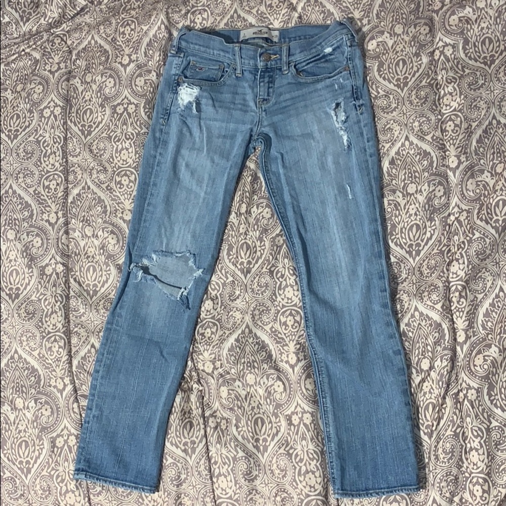 Distressed jeans.